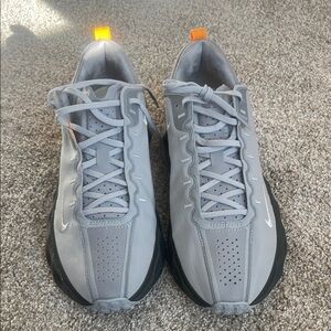Nike Gray and Black Sneakers with Orange Accents